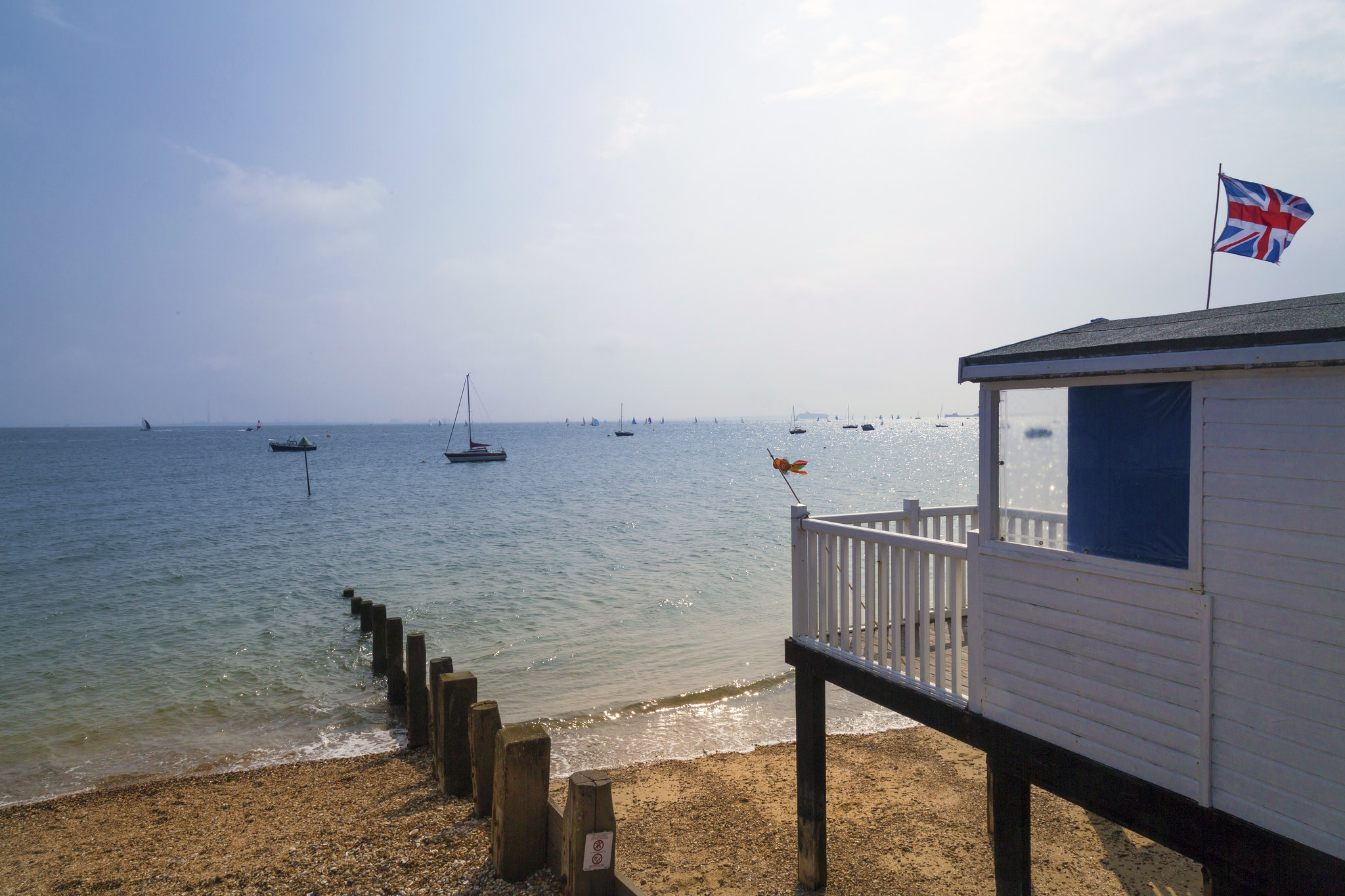 Beach hut and shoreline at Thorpe Bay in Southend-on-Sea.